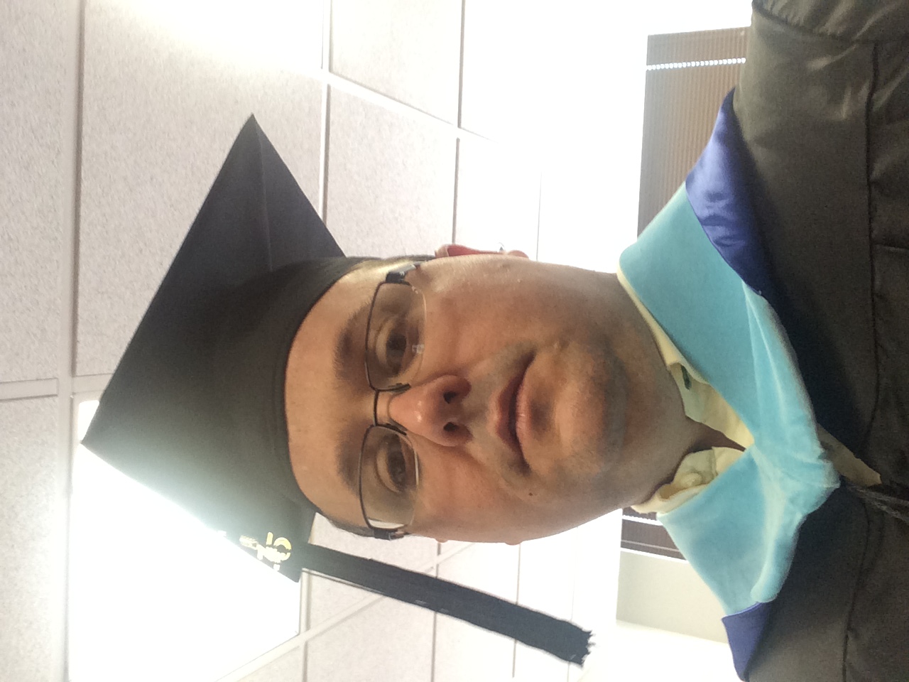 Chef Chris Villa in academic regalia